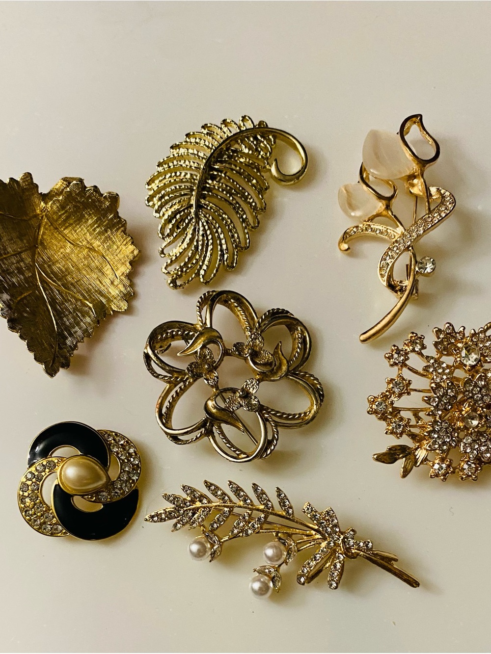 Gold Floral and Leaf Brooch Set - stamps include Monet, Sarah and Ledo 1963